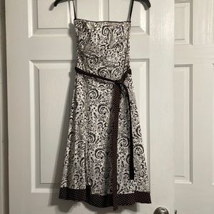 Strapless, brown and white dress.